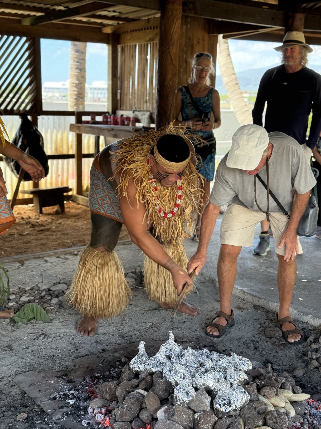 Traditional umu cultural demonstration with performers